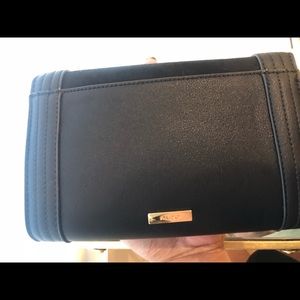 Black clutch with gold chain
